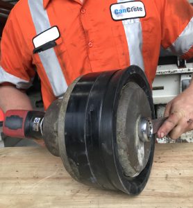 Service technician working on a part